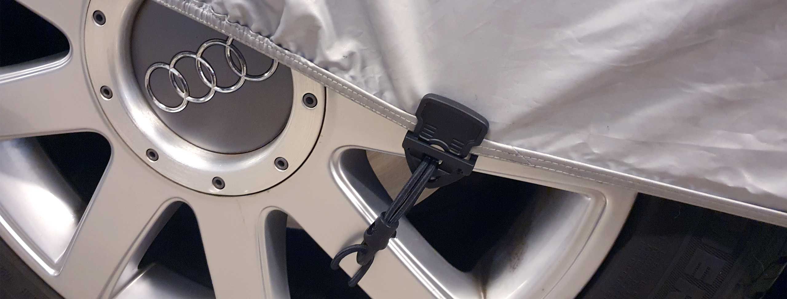 Holdon Clip Xtra securing tarp on Car